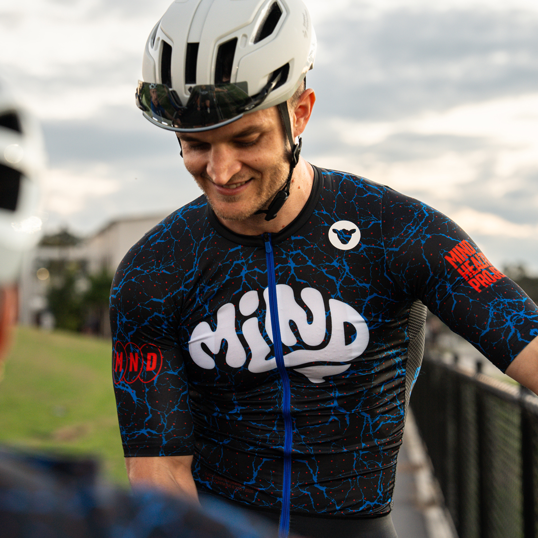 Cyclist wearing the Mind Health jersey